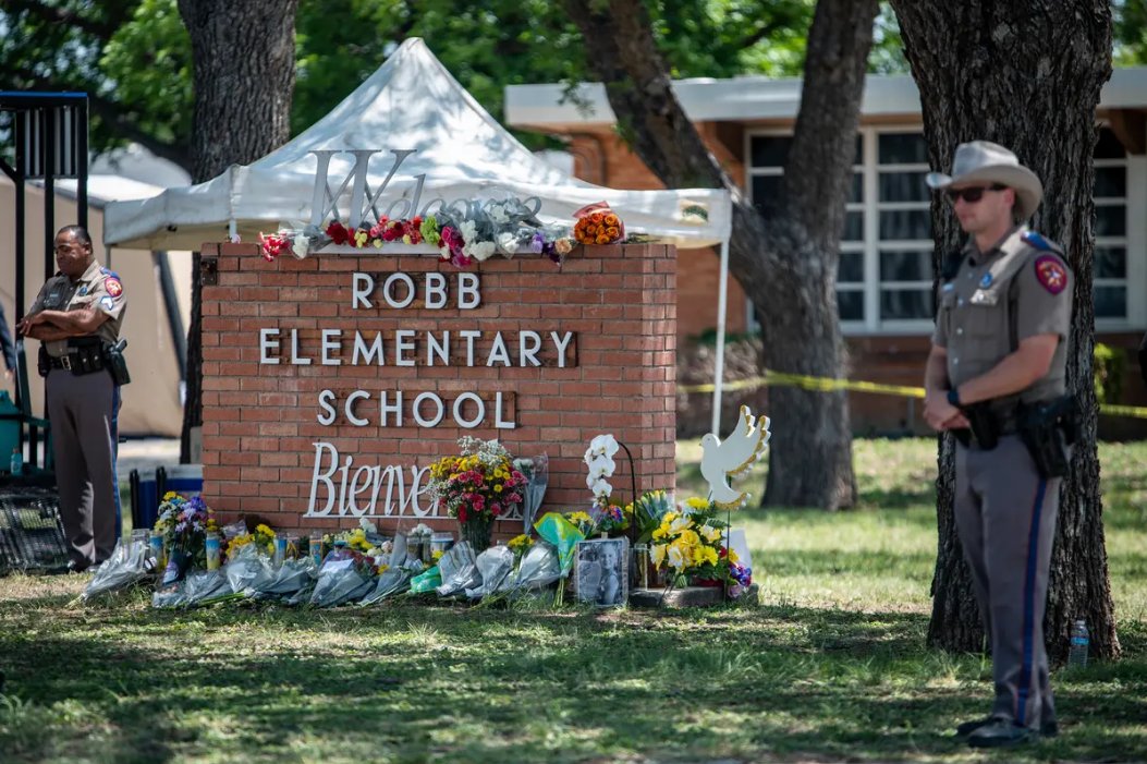 Law enforcement personnel work at the scene of a mass shooting at Robb Elementary School in Uvalde, Texas